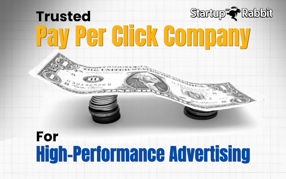 An image for Startup Rabbit, a "Trusted Pay Per Click Company," featuring a dollar bill balanced on stacks of coins.